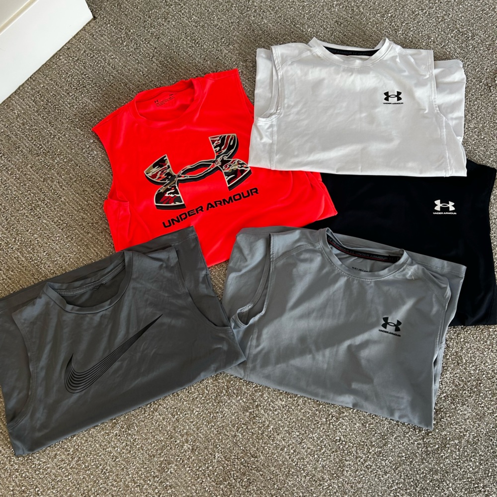 BUNDLE OF 5 Armour TANK TOPS and  1 NIKE top. 4 Large. Orange is Med. 5 TOTAL